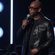 Comedian Dave Chappelle speaks onstage during the 60th Annual GRAMMY Awards on January 28, 2018, in New York City.